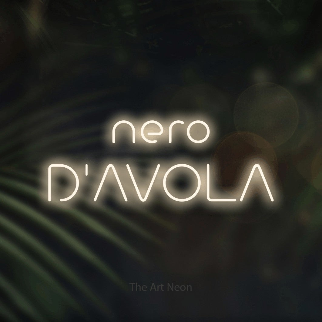 LED neon sign reading “nero D'AVOLA”, arranged in 2 lines.