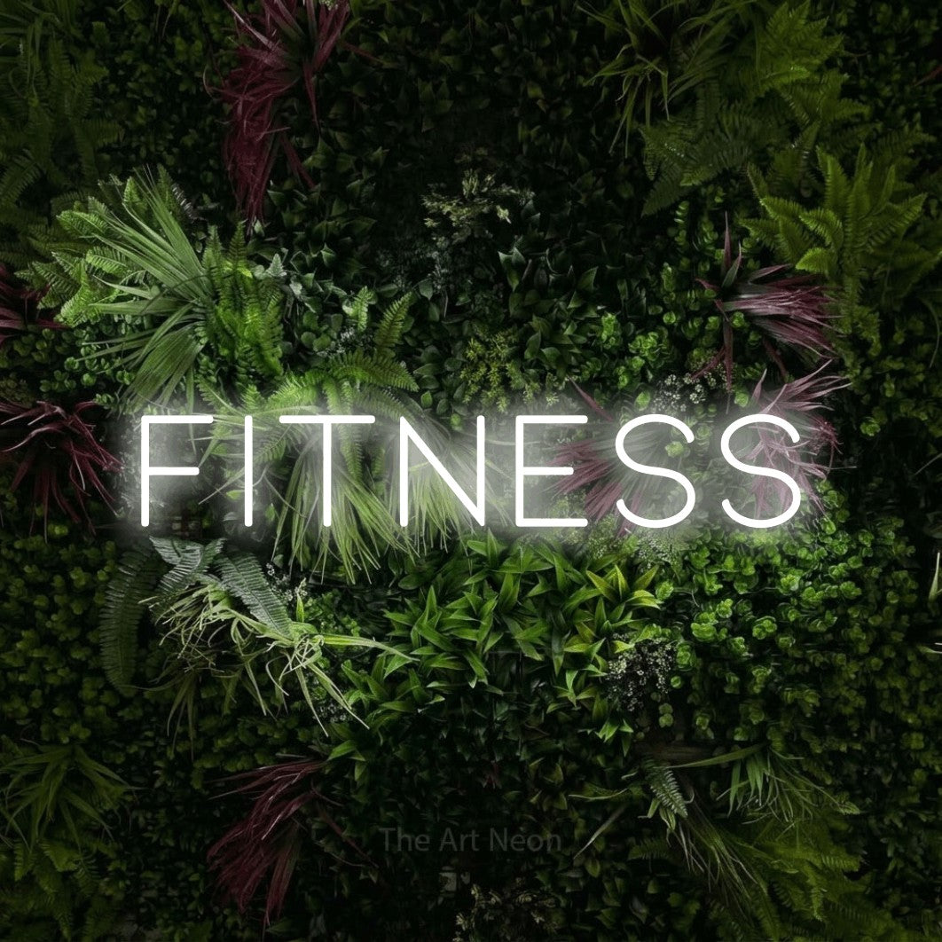LED neon sign reading “fitness”, arranged in a single line.