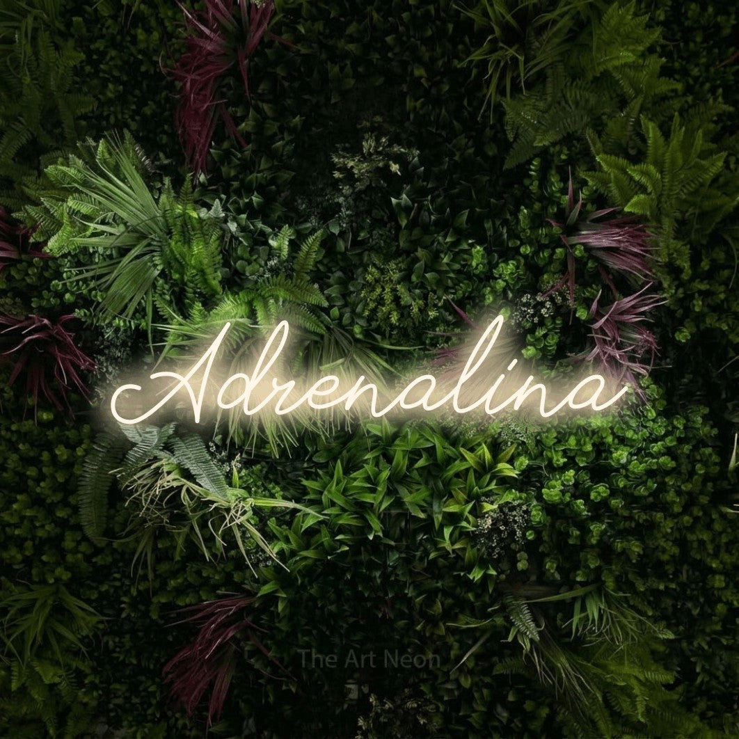 LED neon sign reading “Adrenalina”, arranged in a single line.