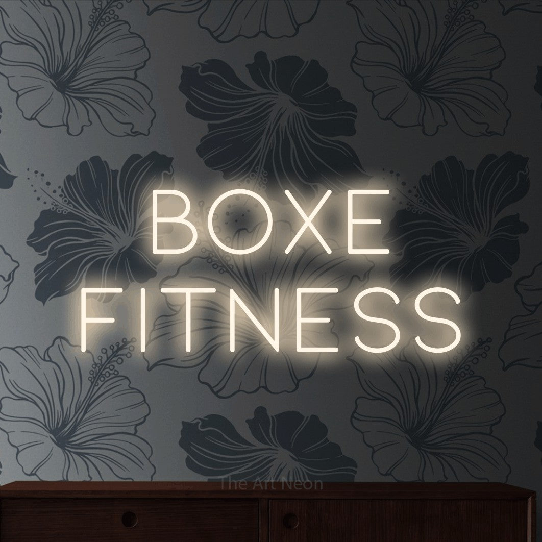LED neon sign reading “boxe fitness”, arranged in 2 lines.