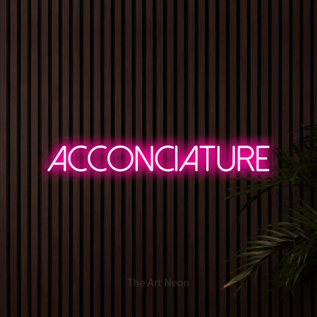 LED neon sign reading “acconciature”, arranged in a single line.