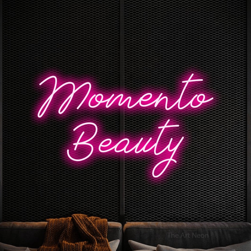 LED neon sign reading “Momento Beauty”, arranged in 2 lines.