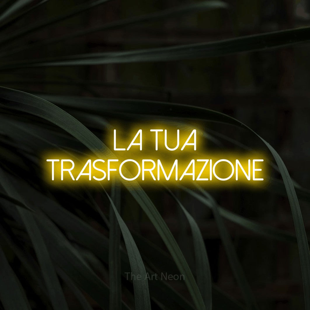 LED neon sign reading “LA TUA TRASFORMAZIONE”, arranged in 2 lines.