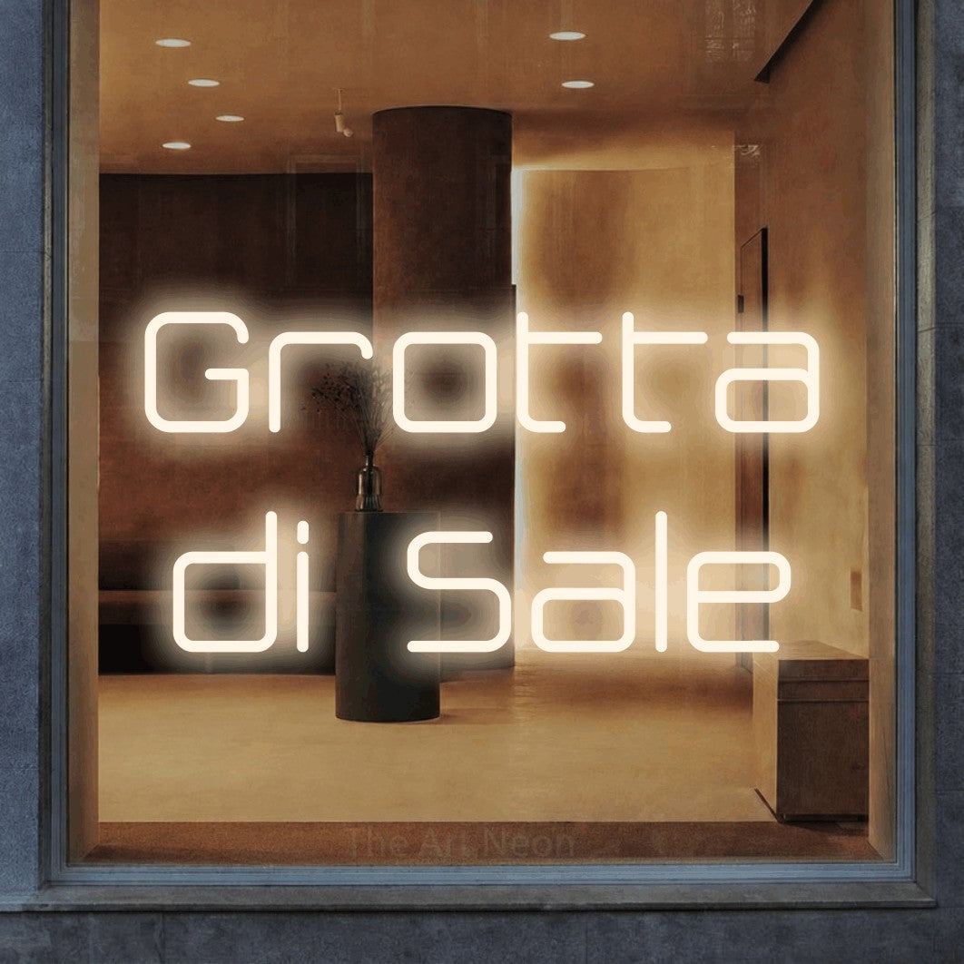 LED neon sign reading “Grotta di Sale”, arranged in 2 lines.