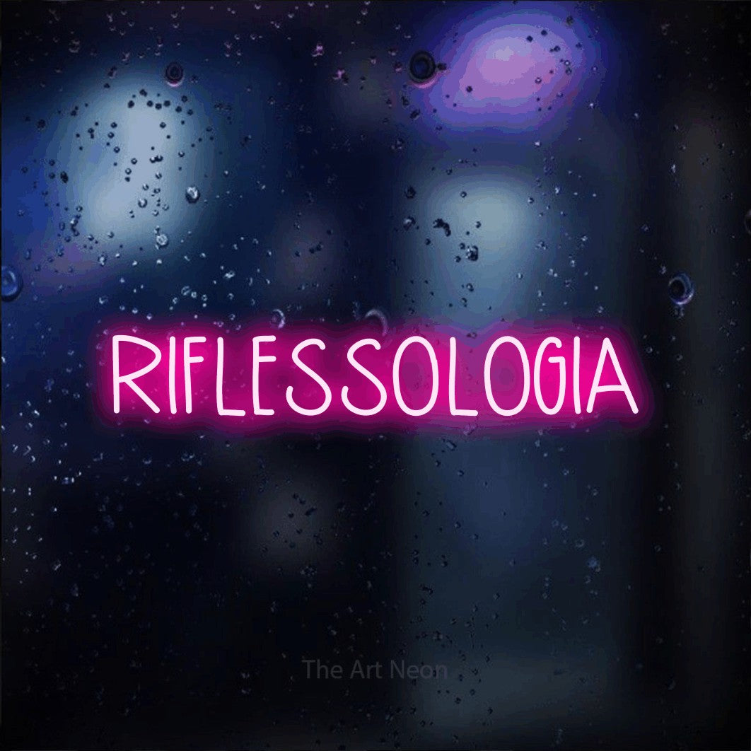 LED neon sign reading “RIFLESSOLOGIA”, arranged in a single line.