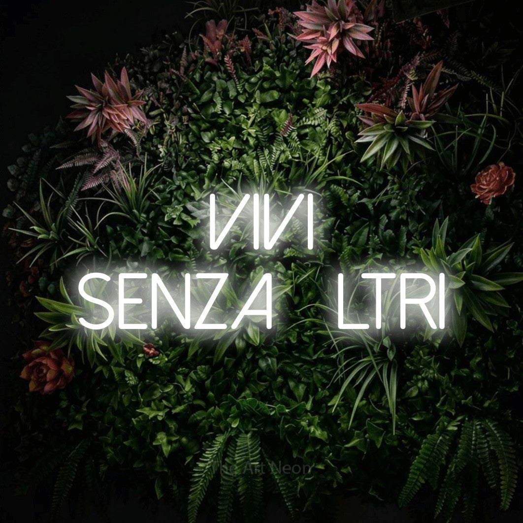 LED neon sign reading “vivi senza filtri”, arranged in 2 lines.