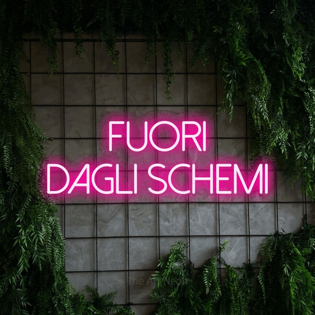 LED neon sign reading “Fuori dagli Schemi”, arranged in 2 lines.