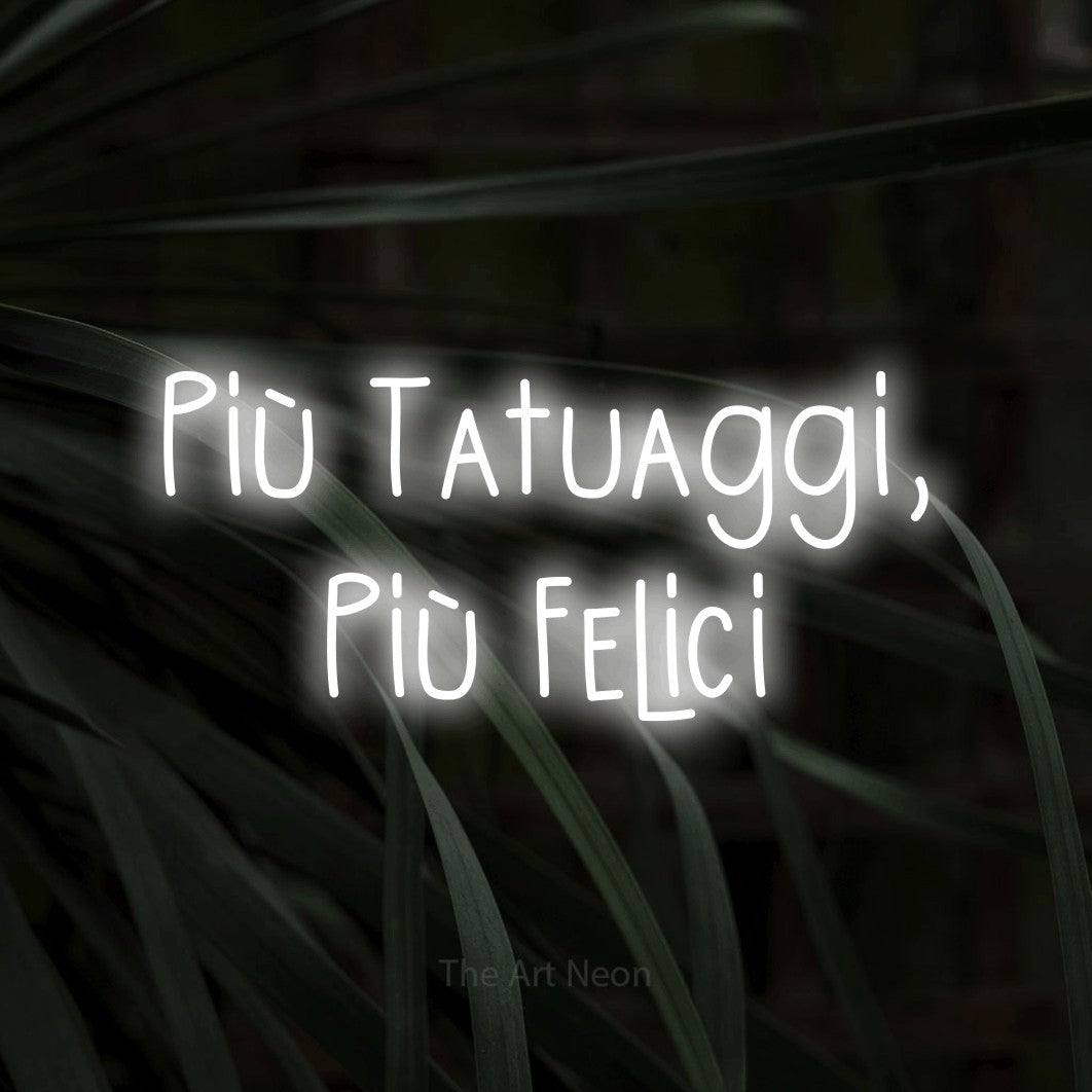 LED neon sign reading “Più Tatuaggi, Più Felici”, arranged in 2 lines.