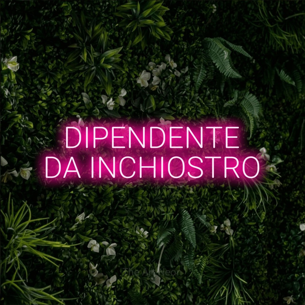 LED neon sign reading “DIPENDENTE DA INCHIOSTRO”, arranged in 2 lines.