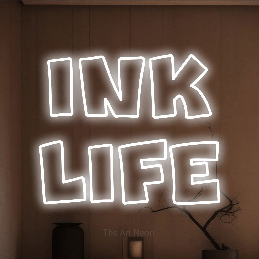 LED neon sign reading “Ink Life”, arranged in 2 lines.