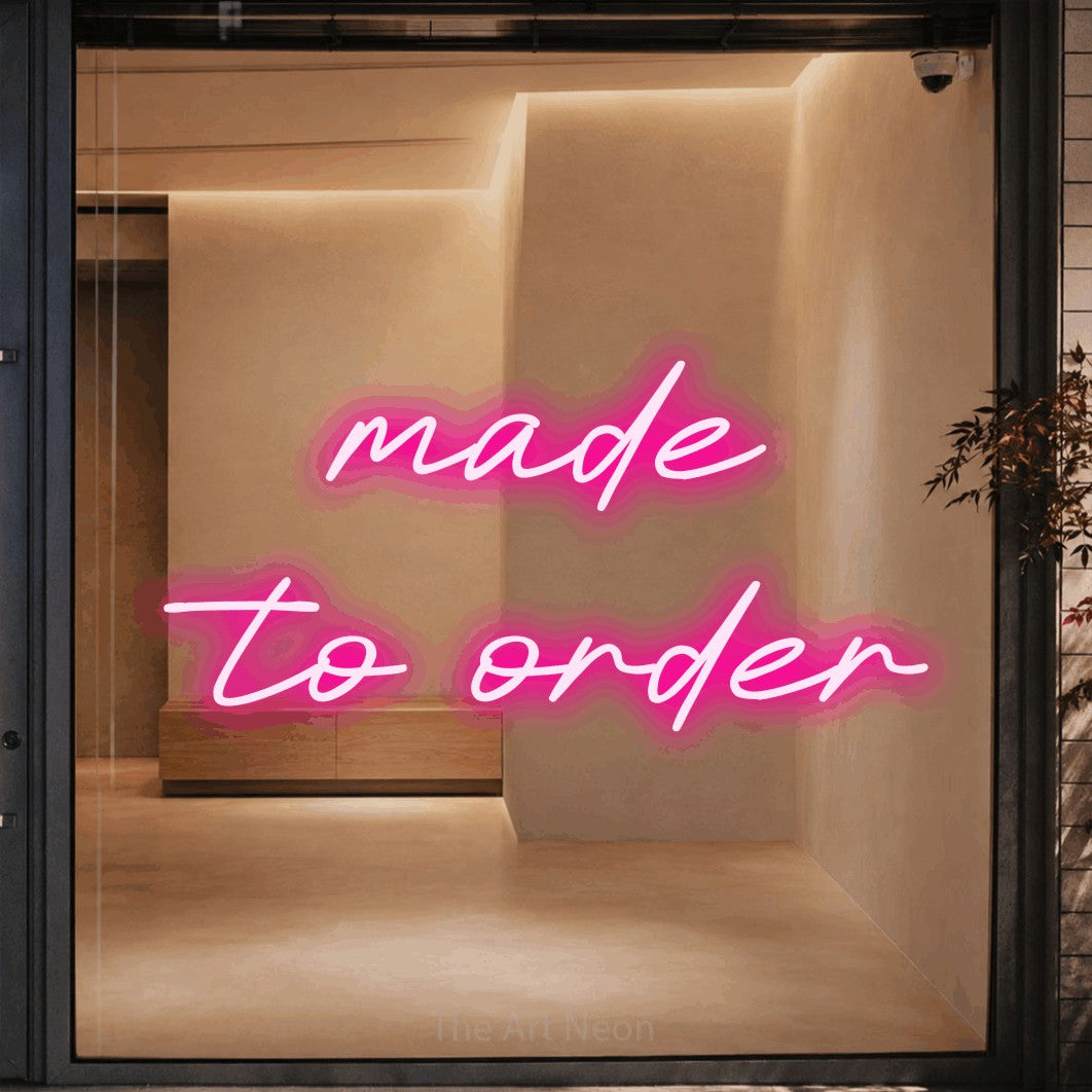 LED neon sign reading “made to order”, arranged in 2 lines.