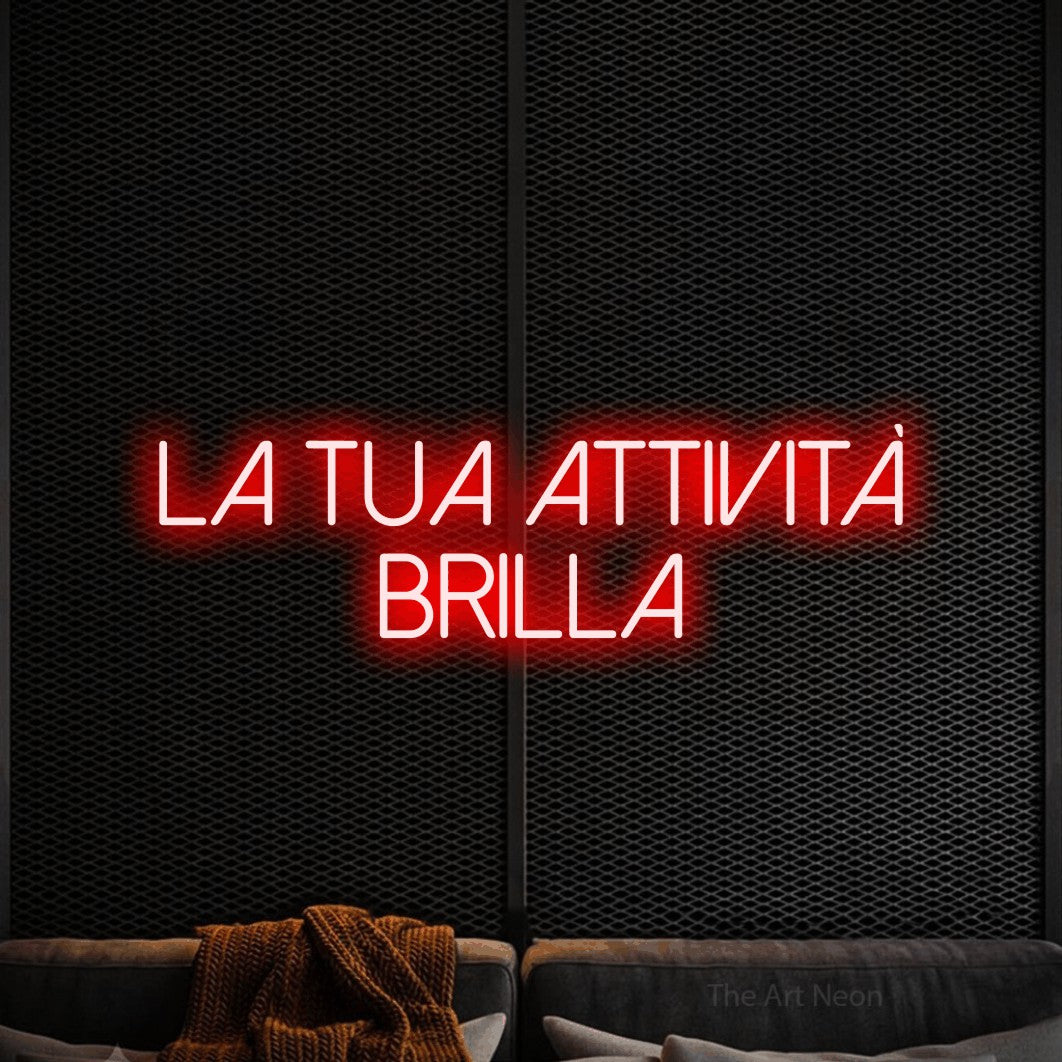 LED neon sign reading “la tua attività brilla”, arranged in 2 lines.
