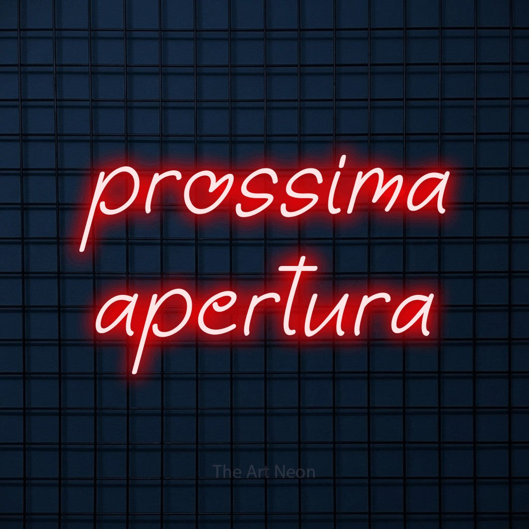 LED neon sign reading “prossima apertura”, arranged in 2 lines.