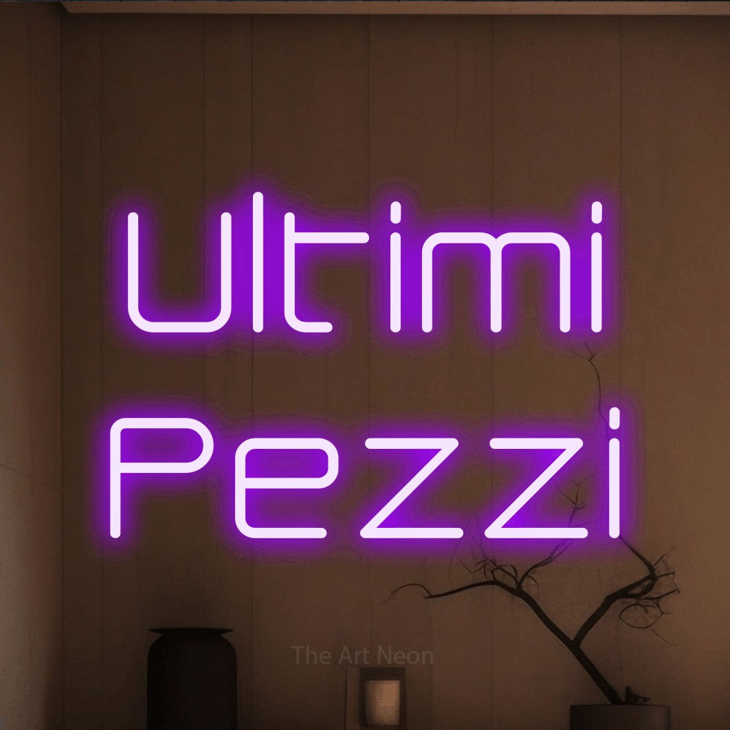 LED neon sign reading “Ultimi Pezzi”, arranged in 2 lines.