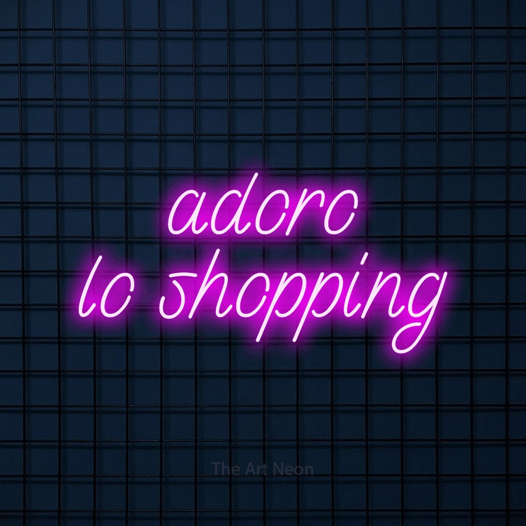 LED neon sign reading “adoro lo shopping”, arranged in 2 lines.