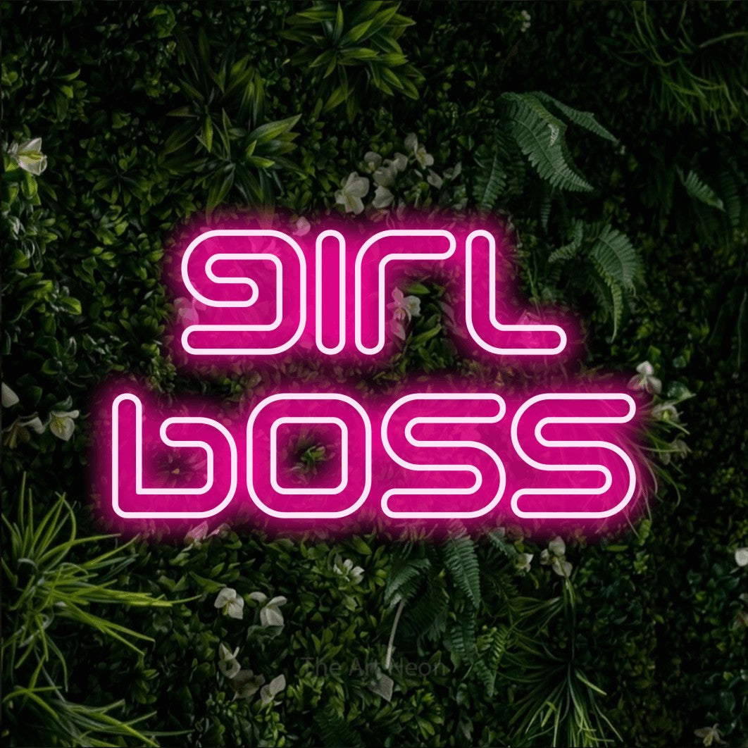 LED neon sign reading “girl boss”, arranged in 2 lines.