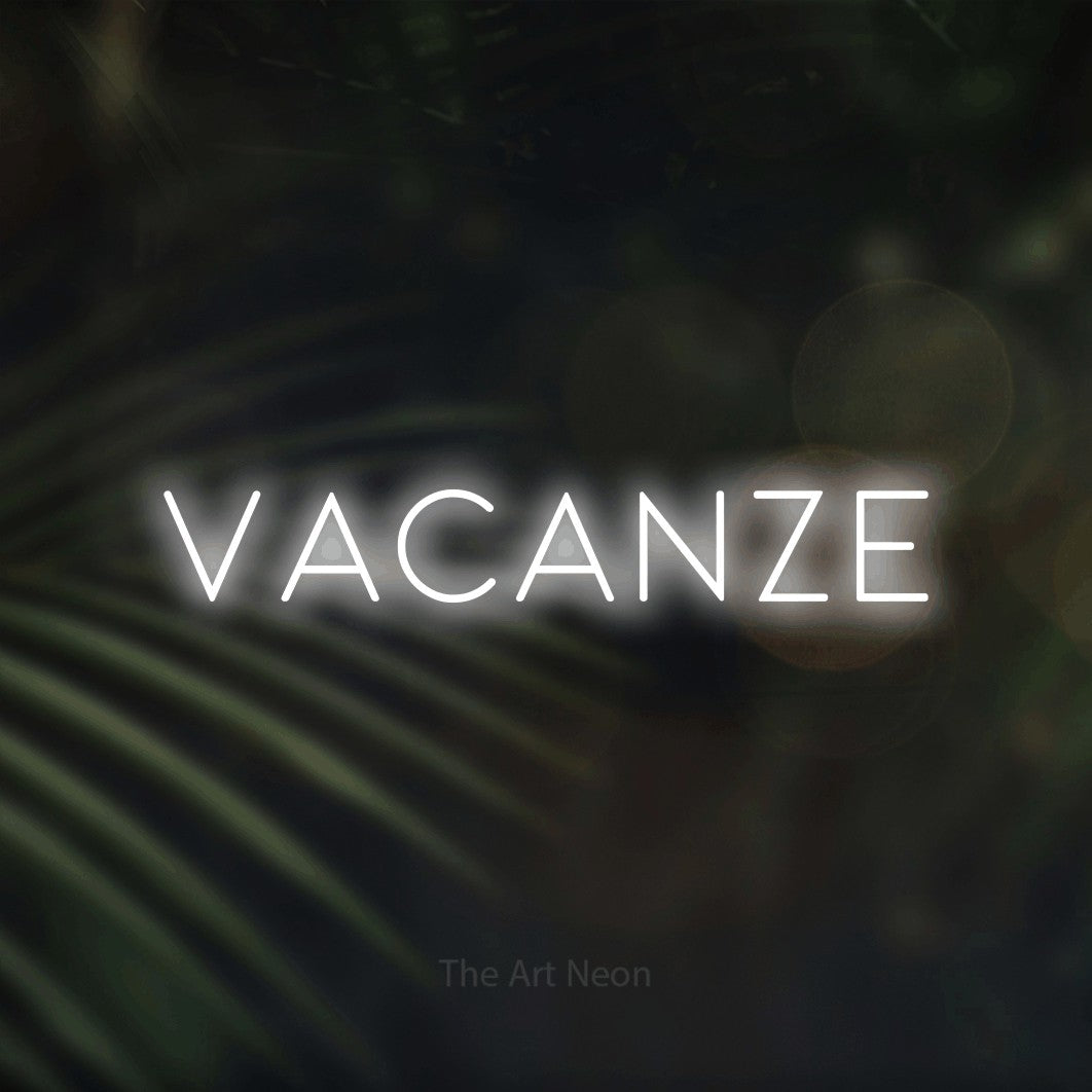 LED neon sign reading “Vacanze”, arranged in a single line.