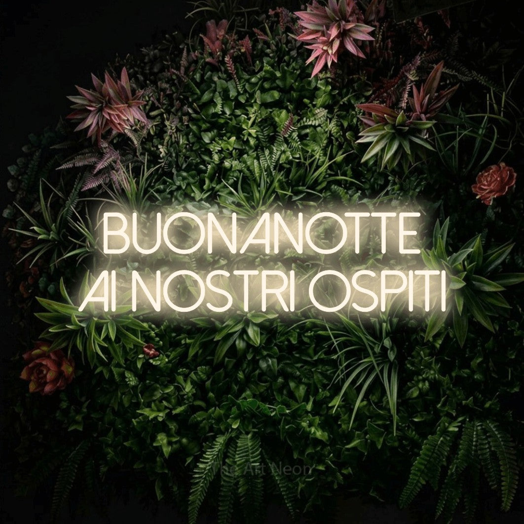 LED neon sign reading “BUONANOTTE AI NOSTRI OSPITI”, arranged in 2 lines.