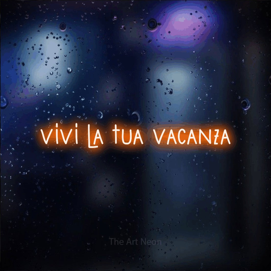 LED neon sign reading “vivi la tua vacanza”, arranged in a single line.
