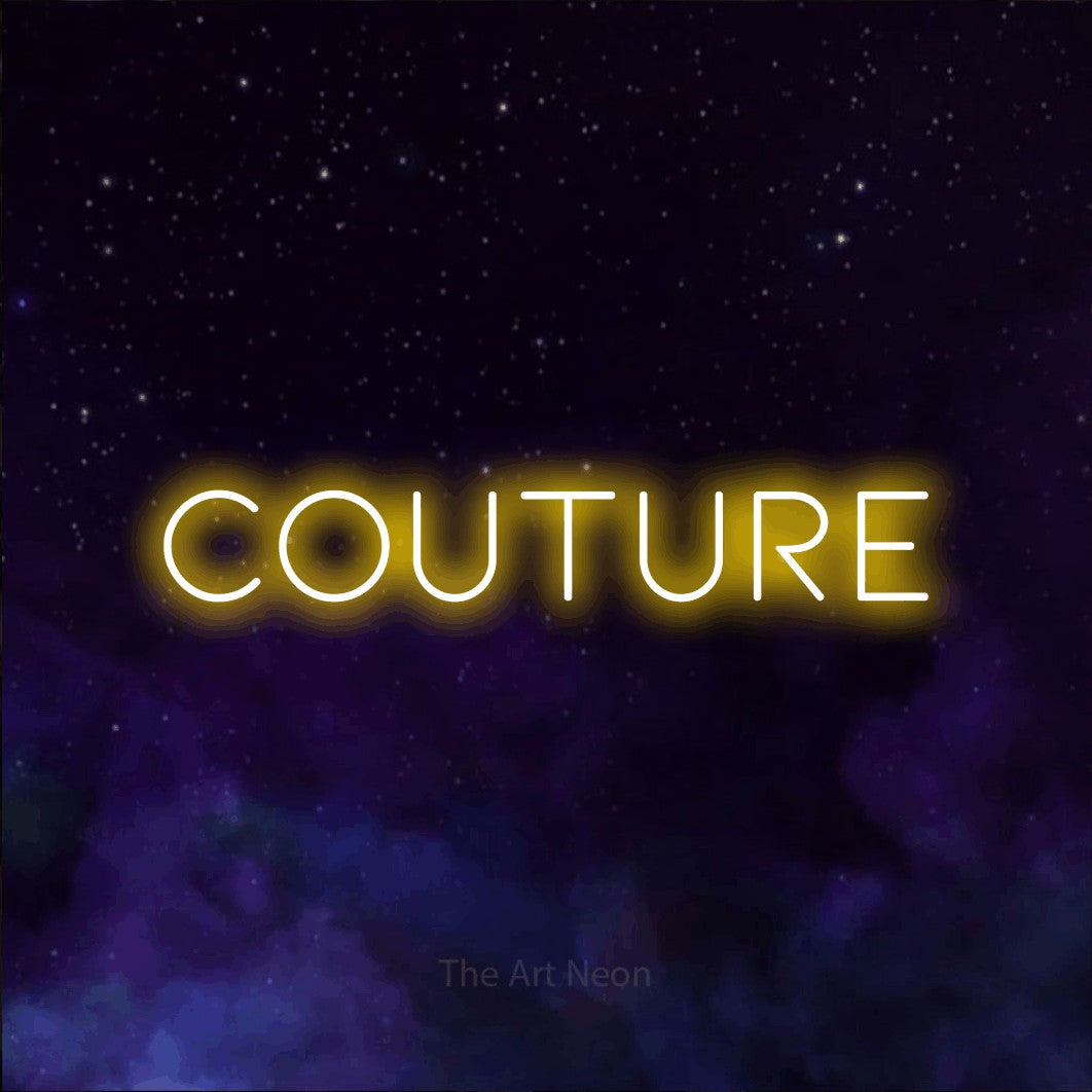 LED neon sign reading “Couture”, arranged in a single line.