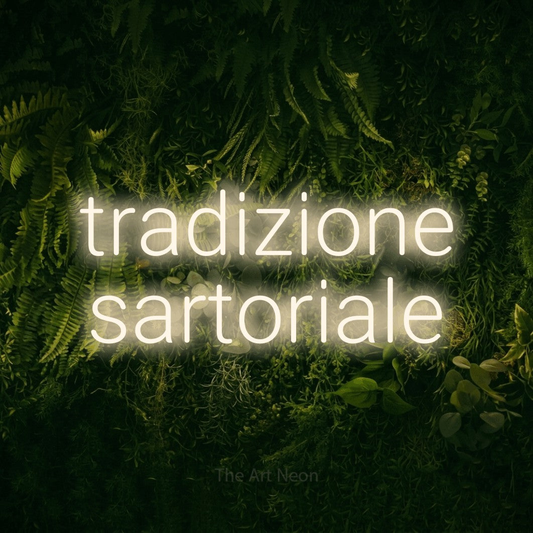 LED neon sign reading “tradizione sartoriale”, arranged in 2 lines.