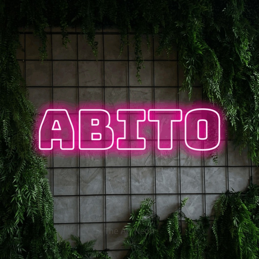LED neon sign reading “abito”, arranged in a single line.