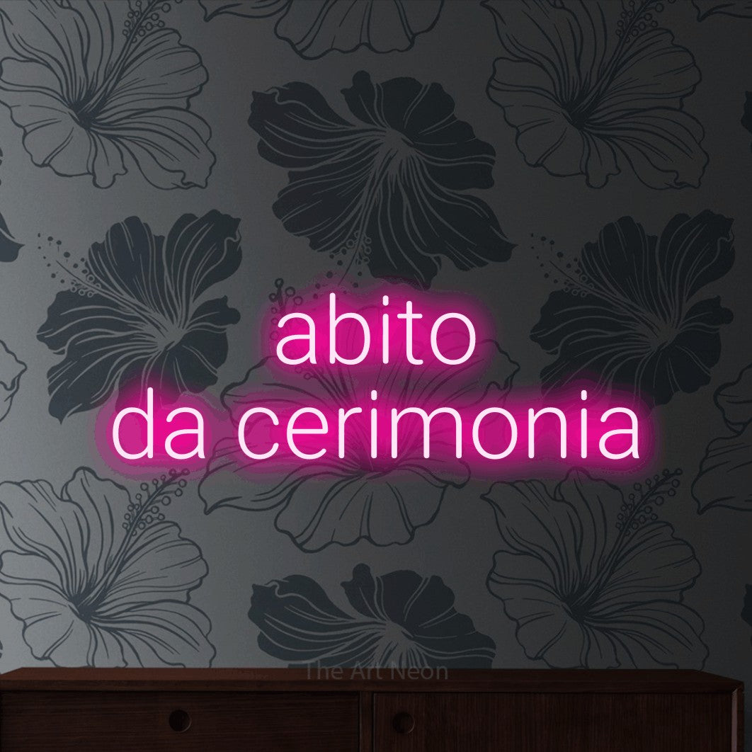 LED neon sign reading “abito da cerimonia”, arranged in 2 lines.