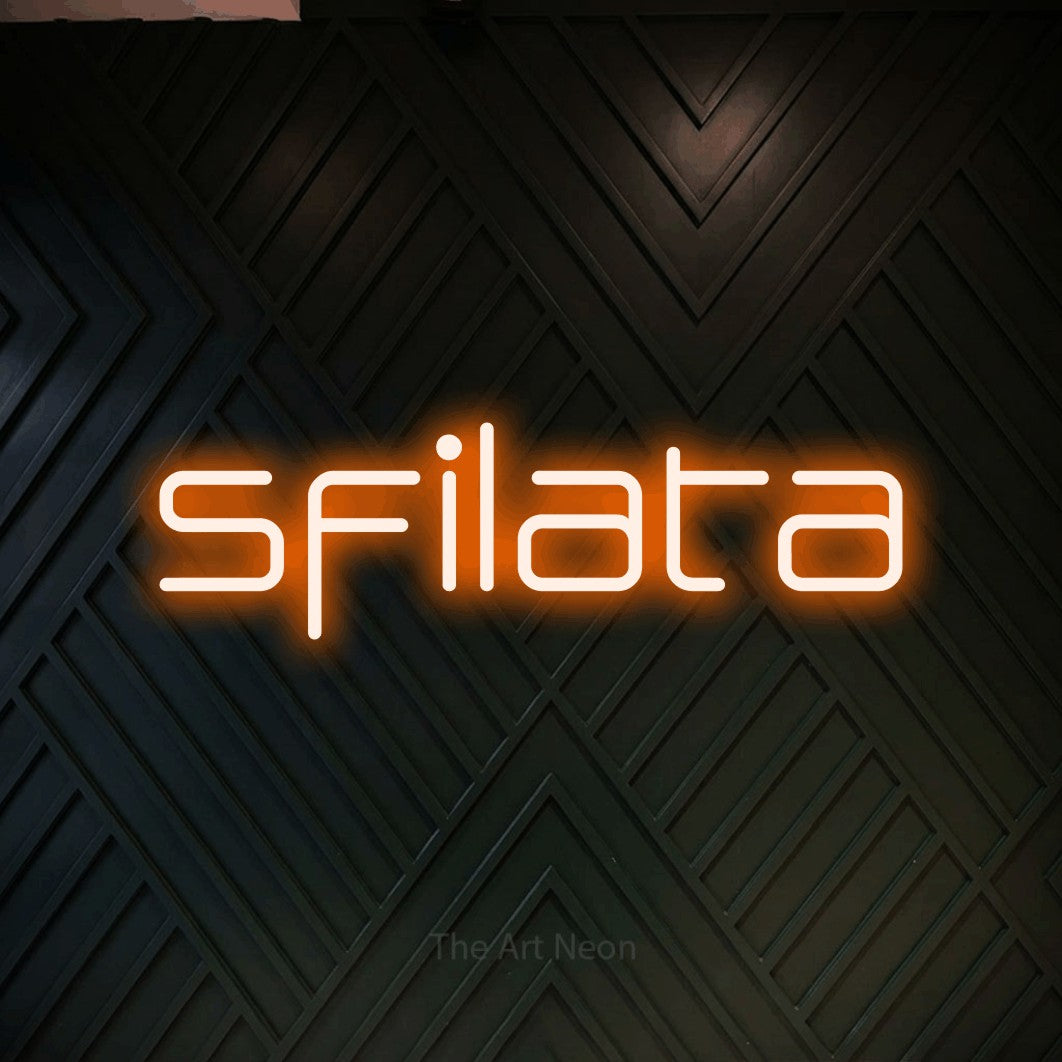 LED neon sign reading “sfilata”, arranged in a single line.