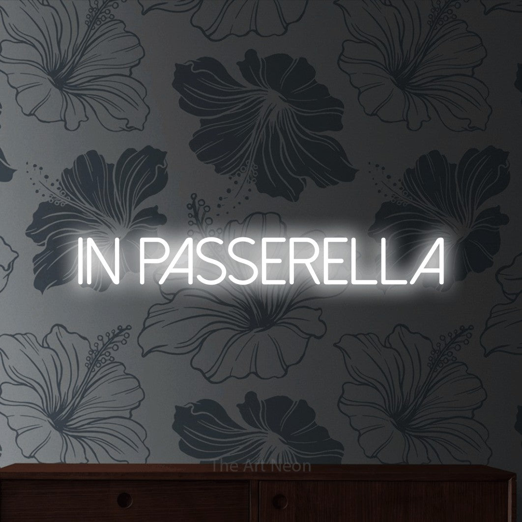 LED neon sign reading “In Passerella”, arranged in a single line.