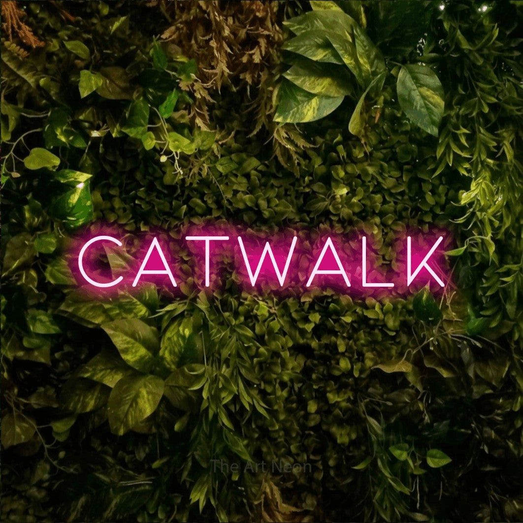 LED neon sign reading “Catwalk”, arranged in a single line.