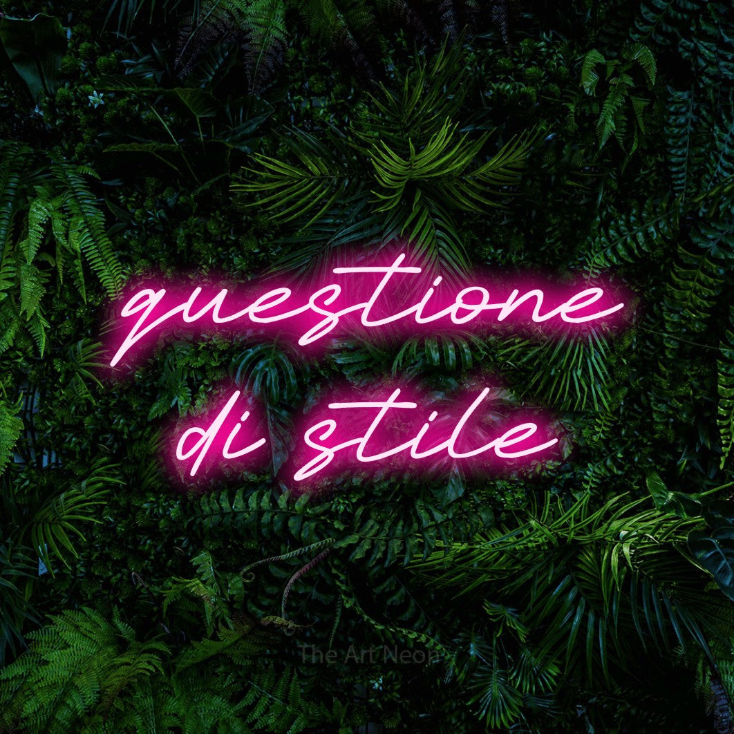 LED neon sign reading “questione di stile”, arranged in 2 lines.