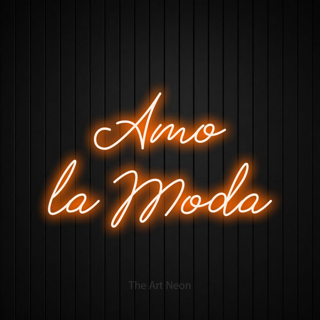 LED neon sign reading “Amo la Moda”, arranged in 2 lines.