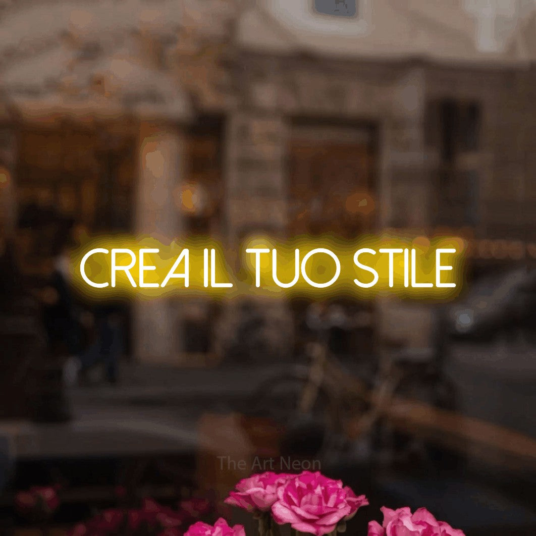 LED neon sign reading “crea il tuo STILE”, arranged in a single line.