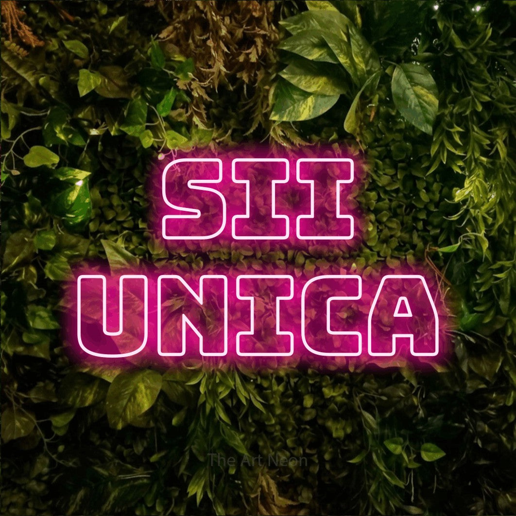 LED neon sign reading “SII UNICA”, arranged in 2 lines.