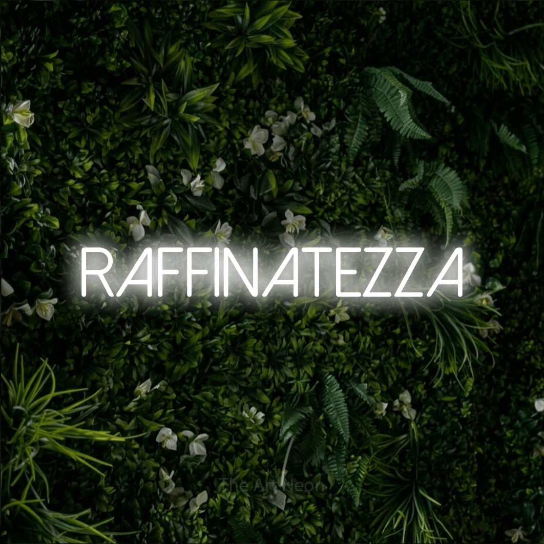 LED neon sign reading “RAFFINATEZZA”, arranged in a single line.