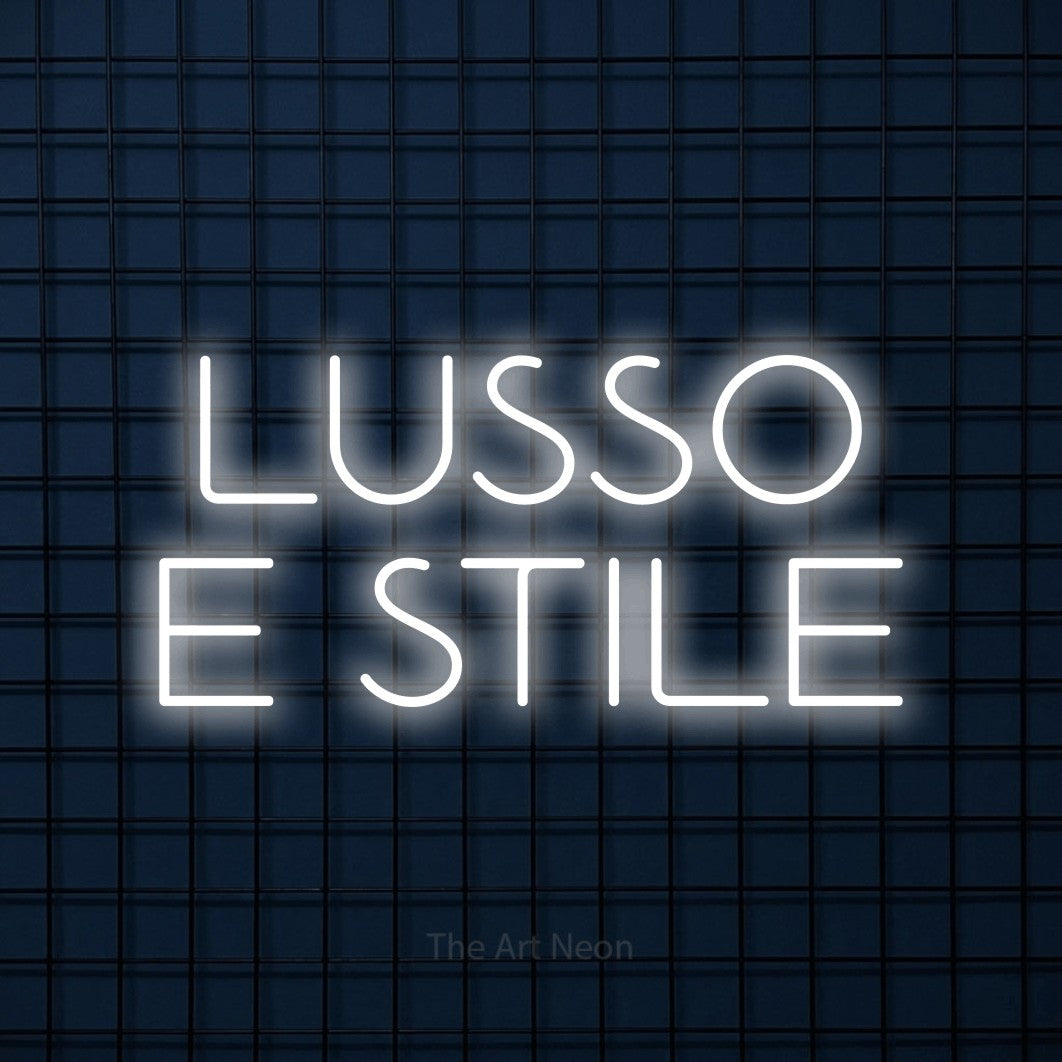 LED neon sign reading “LUSSO E STILE”, arranged in 2 lines.