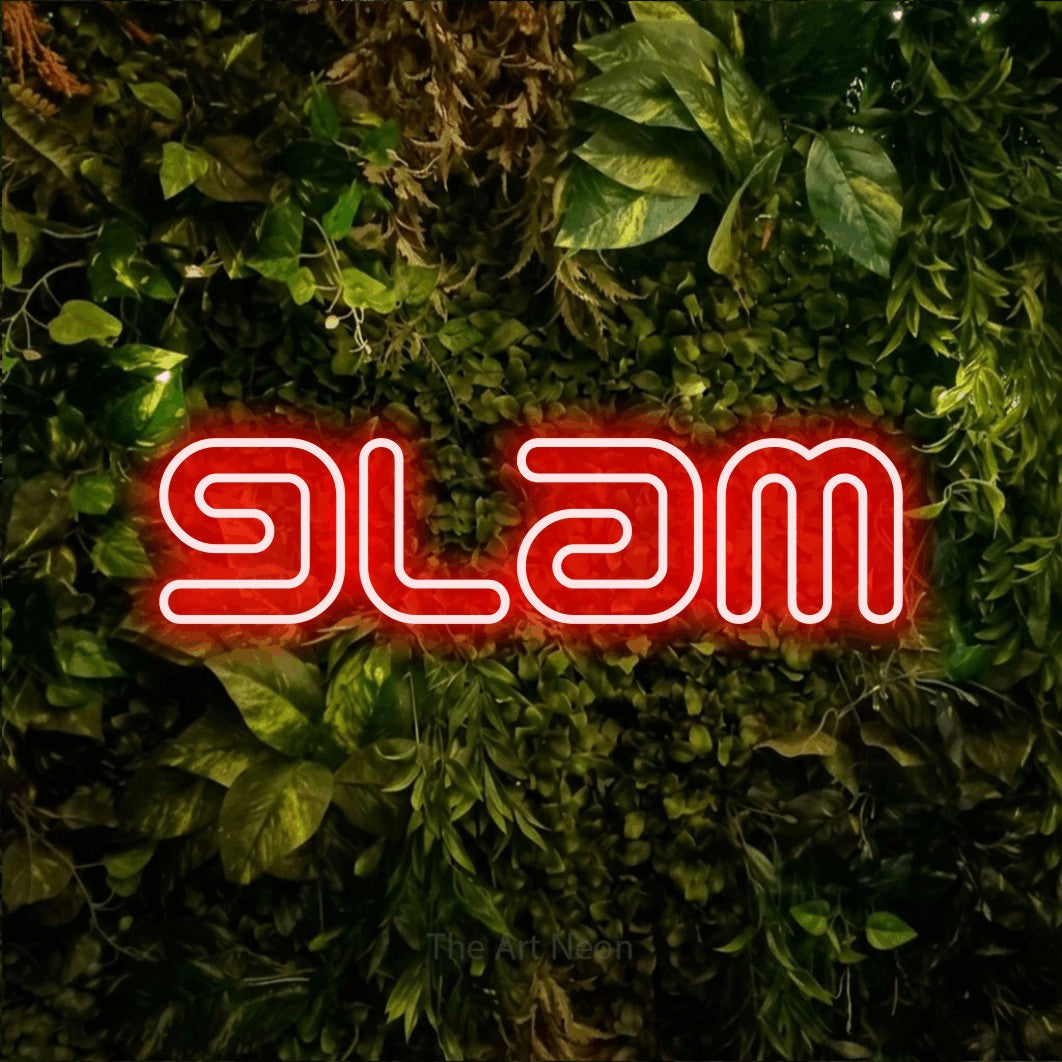 LED neon sign reading “glam”, arranged in a single line.