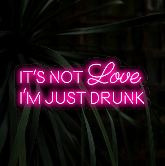 "Not Love Just Drunk Neon Sign" - A playful and humorous neon creation, setting a carefree and fun vibe in your surroundings.
