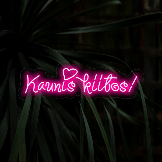 "Kaunis Kiitos! Neon Sign" - Illuminate your gratitude with this beautiful neon sign. Its warm glow adds a touch of elegance to spaces where appreciation is cherished.