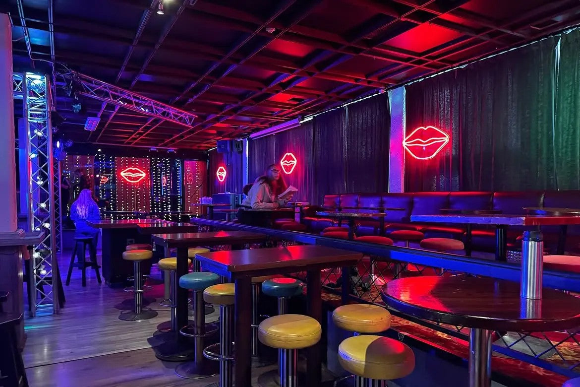 Red lip-shaped LED neon signs used on a Solar Films production set in Finland