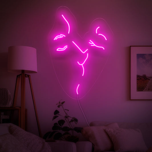 "Kissing Couple Abstract Neon Sign" – Set the mood with this romantic neon sign. Perfect for bedrooms and intimate spaces.
