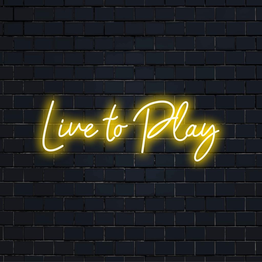 LED neon sign with the phrase Live To Play, glowing vibrantly. Ideal for expressive neon art enthusiasts.