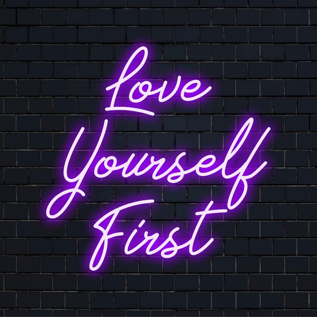 LED neon sign with Love Yourself First, handmade, perfect for personalized home decor or inspirational wall art.