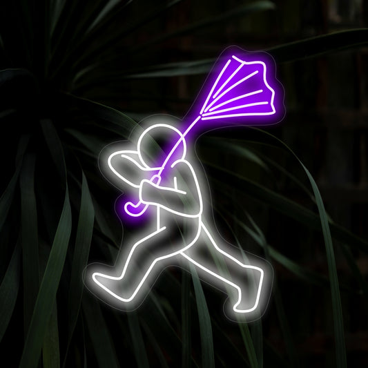 "Man Tries To Hold His Umbrella Neon Sign" is a quirky and humorous addition for spaces with a touch of whimsy. Illuminate with a playful atmosphere!