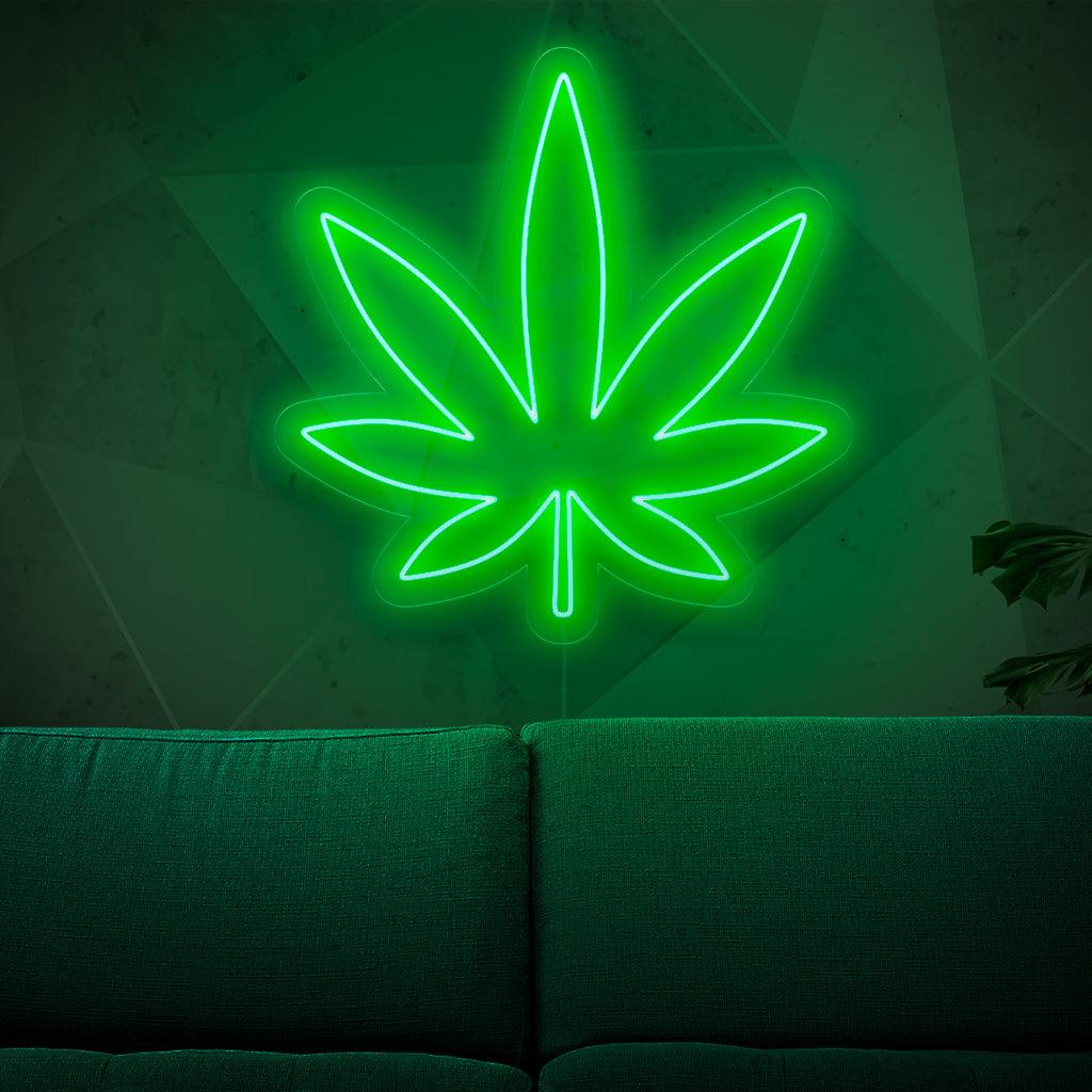 Podświetlany neon z liściem marihuany, symbolizujący kulturę konopi i marihuany, dodający odrobinę ziołowego uroku każdej przestrzeni