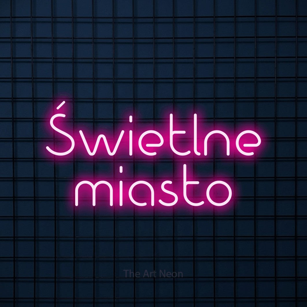 LED neon sign reading “Świetlne miasto”, arranged in two lines.