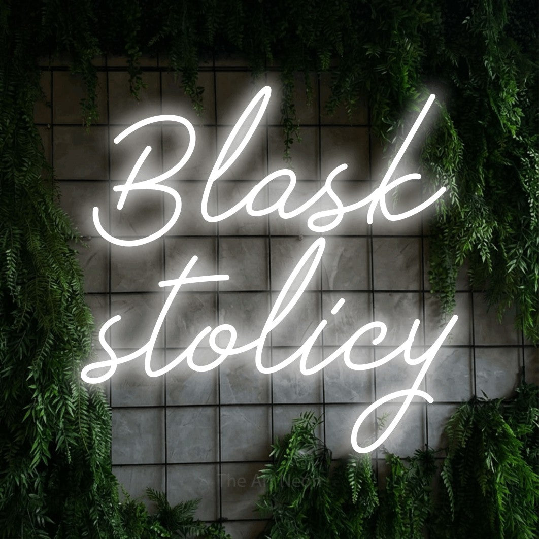 LED neon sign reading “Blask stolicy”, arranged in two lines.