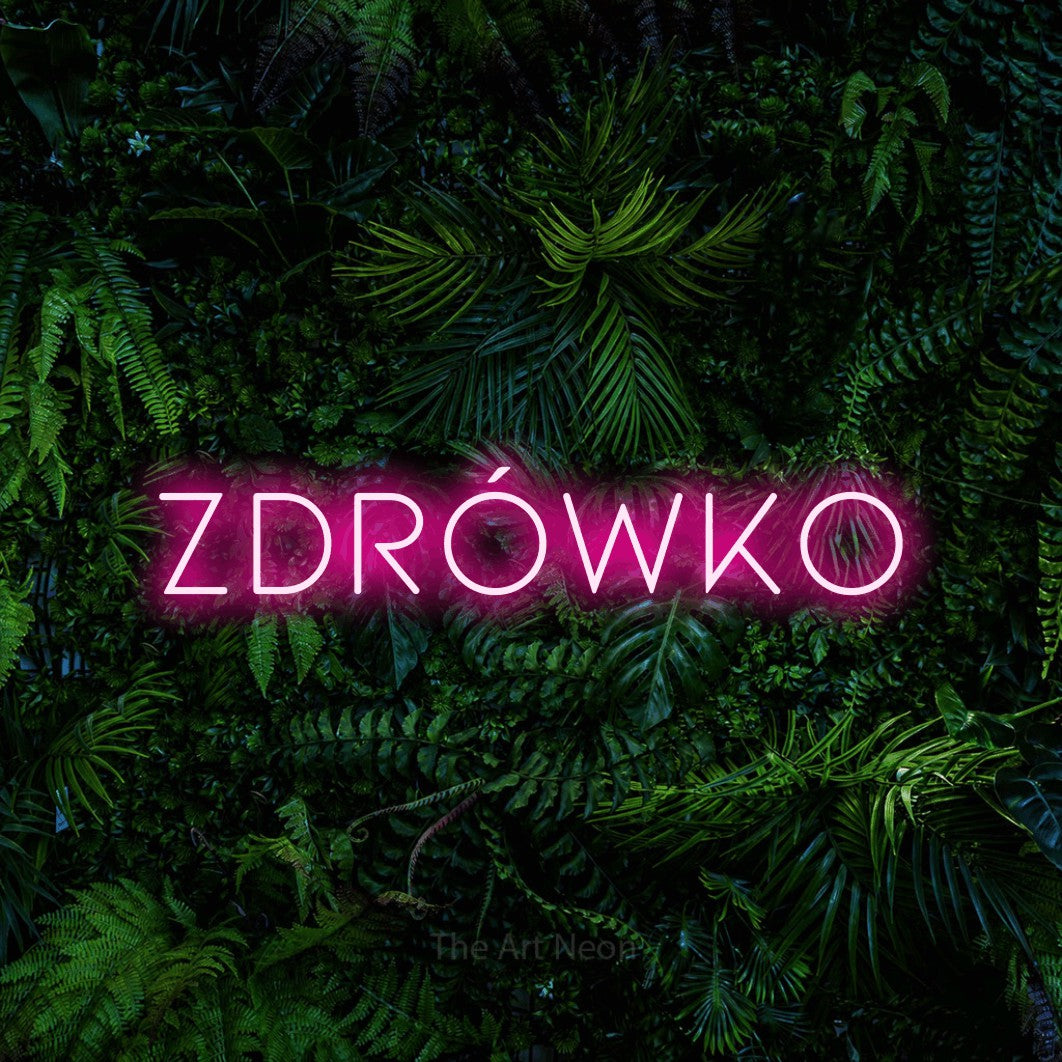 LED neon sign reading “Zdrówko”, arranged in a single line.