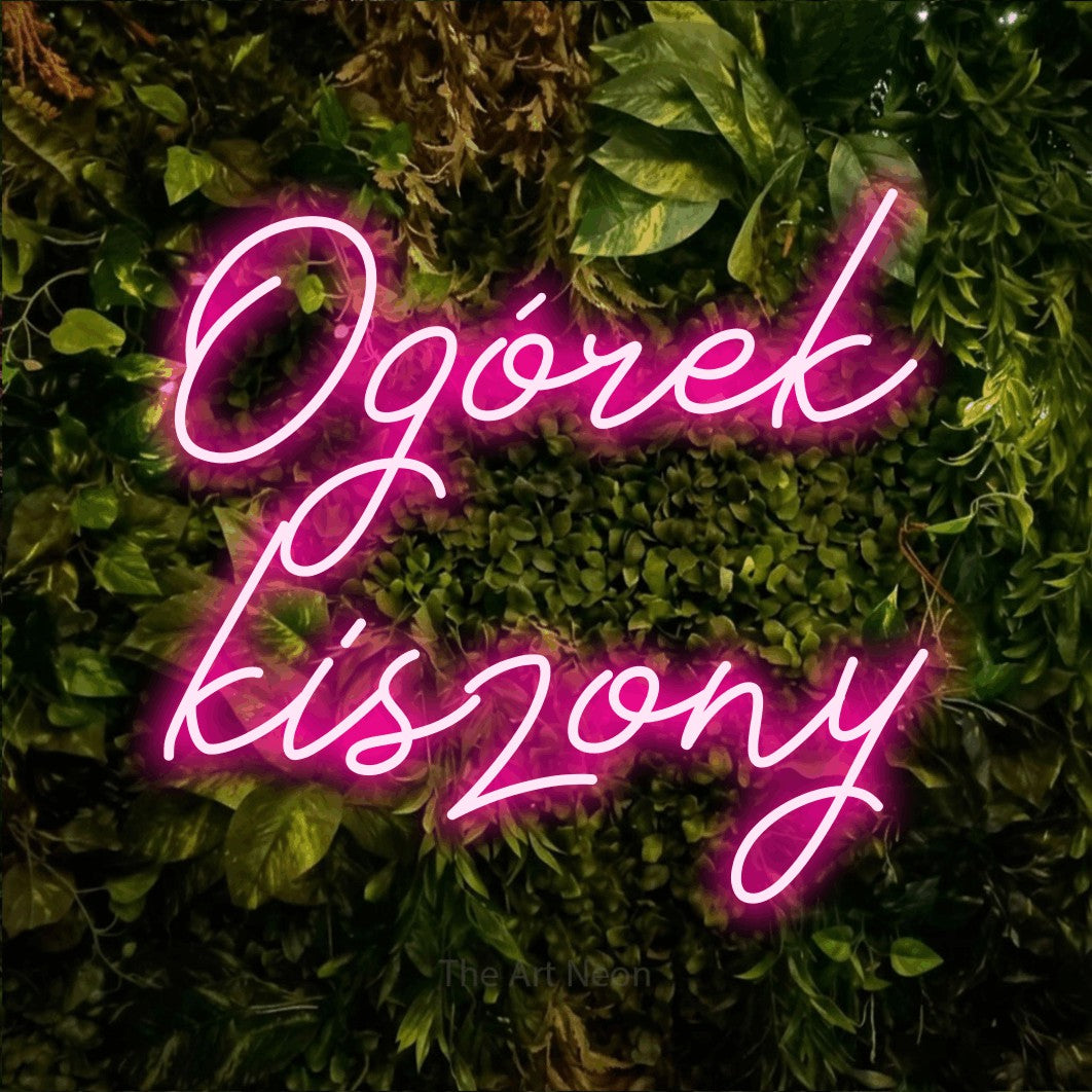 LED neon sign reading “Ogórek kiszony”, arranged in two lines.