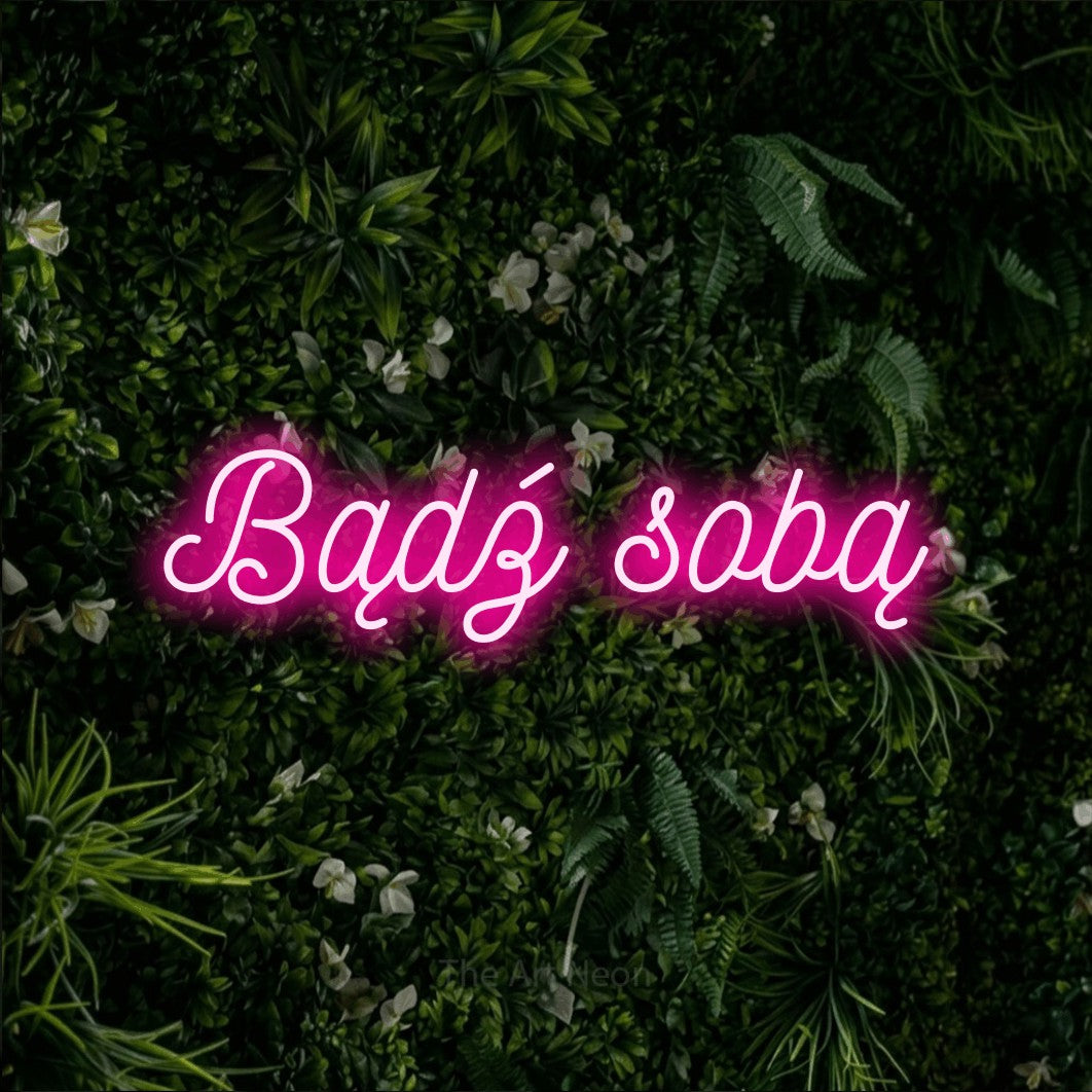 LED neon sign reading “Bądź sobą”, arranged in a single line.